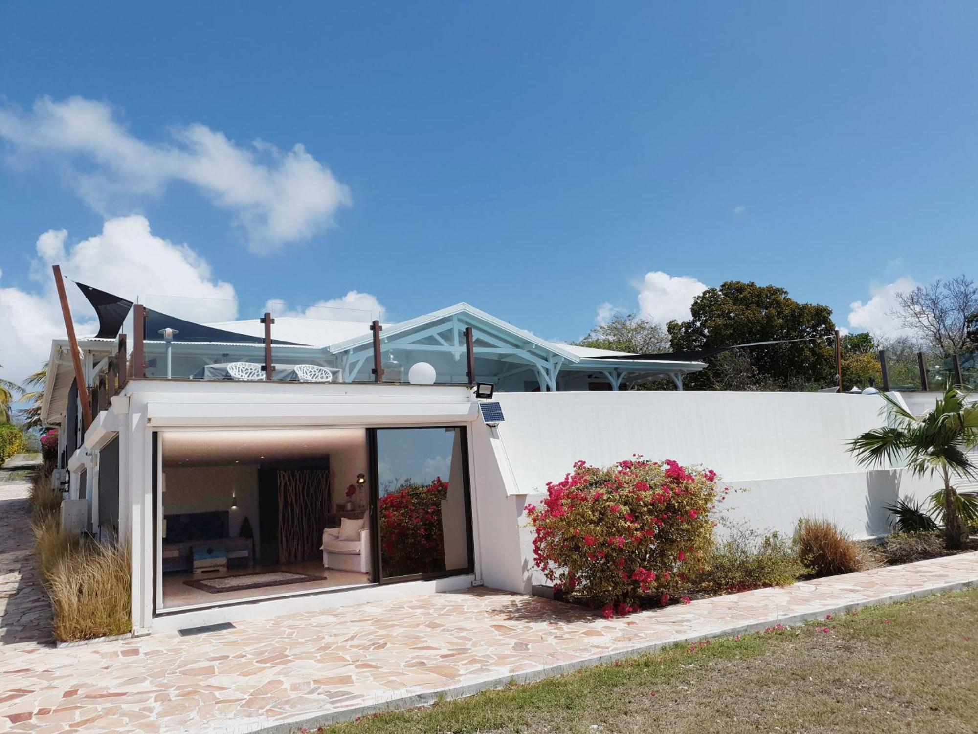 Villa Deluxe L'Hacienda Villa Vue Mer 180 Piscine Jacuzzi Proche Plage Marina Golf Pointe Des Chateaux Et Casino Jardin Clos Voyage Durable Saint-Francois  Chambre photo