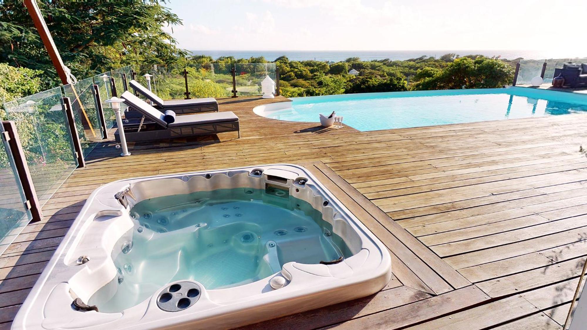 Villa Deluxe L'Hacienda Villa Vue Mer 180 Piscine Jacuzzi Proche Plage Marina Golf Pointe Des Chateaux Et Casino Jardin Clos Voyage Durable Saint-Francois  Chambre photo